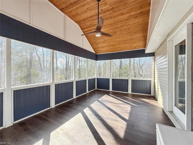 unfurnished sunroom featuring wooden ceiling, vaulted ceiling, and ceiling fan