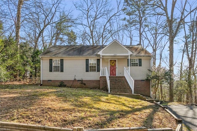 view of front of home with a porch, a front yard, and crawl space