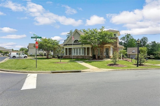 view of front of property with a front lawn