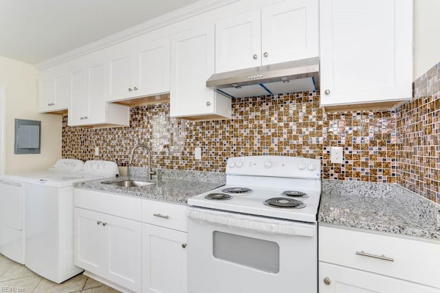 kitchen featuring light tile patterned flooring, washing machine and dryer, under cabinet range hood, white electric range, and a sink