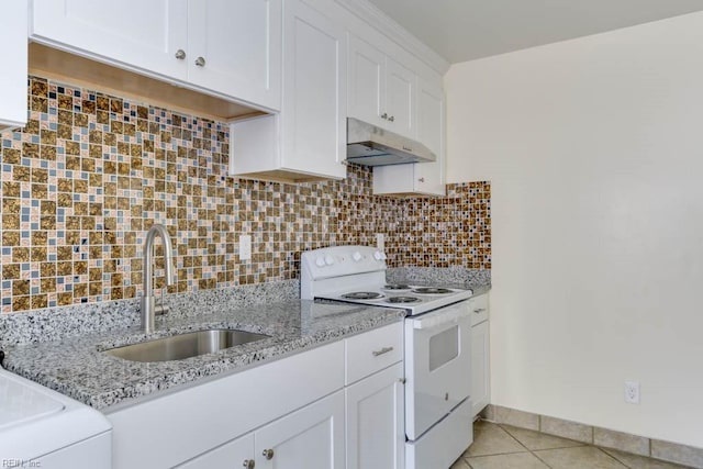 kitchen with light tile patterned floors, under cabinet range hood, a sink, tasteful backsplash, and white range with electric cooktop