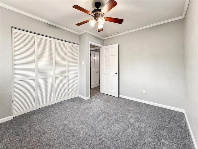 unfurnished bedroom featuring baseboards, carpet, and crown molding