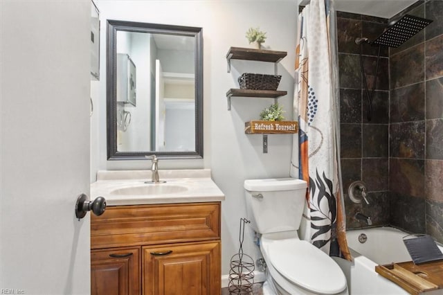 bathroom featuring toilet, shower / tub combo with curtain, and vanity