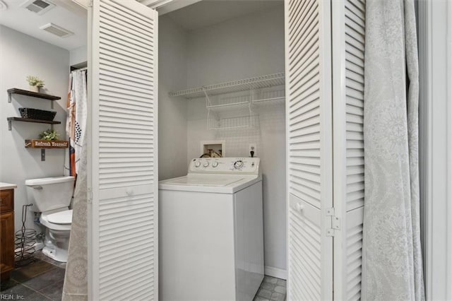 laundry room featuring laundry area, washer / clothes dryer, and visible vents