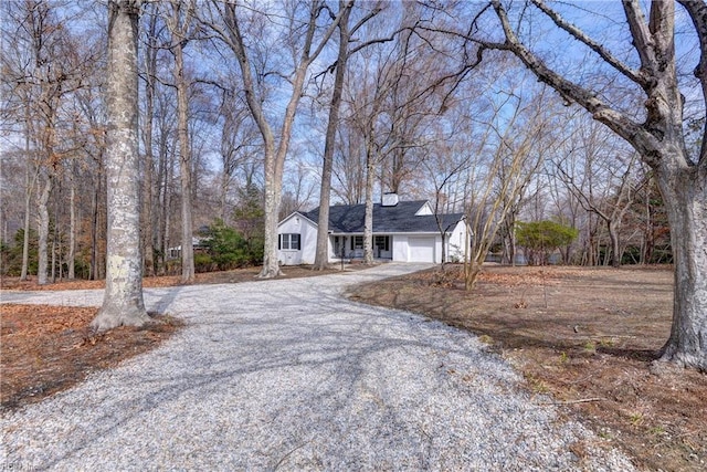 view of front facade with driveway and an attached garage