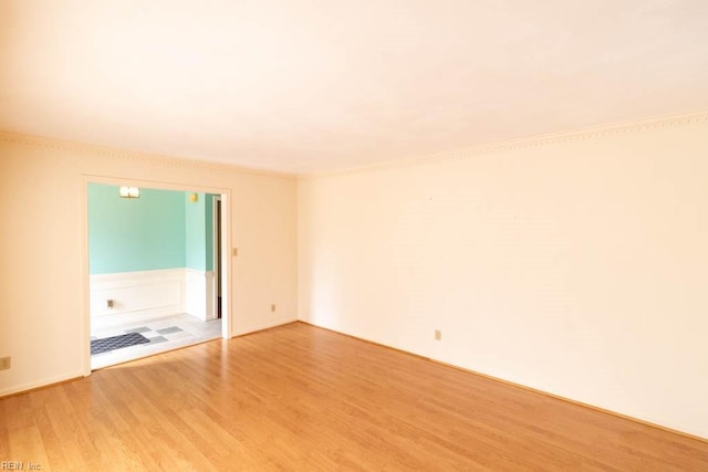 spare room with light wood-type flooring