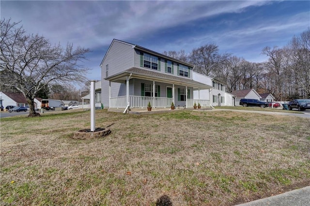 view of front of house featuring a front lawn and a porch