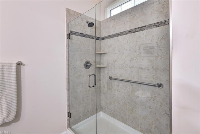 full bathroom featuring a stall shower