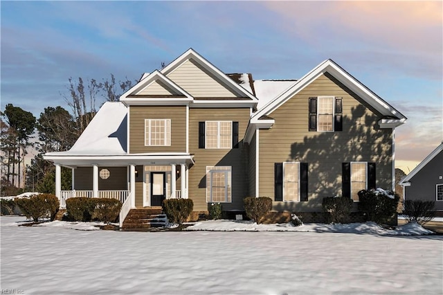 traditional-style home featuring a porch