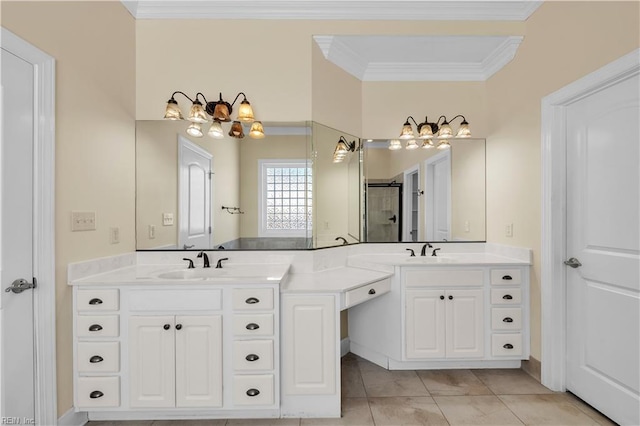 full bathroom with double vanity, ornamental molding, a stall shower, and a sink