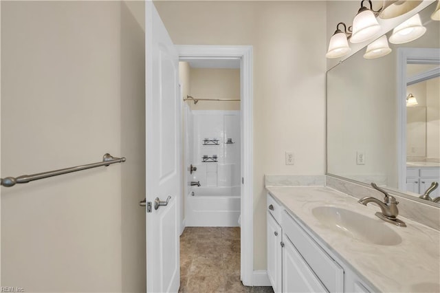 full bathroom featuring  shower combination and vanity