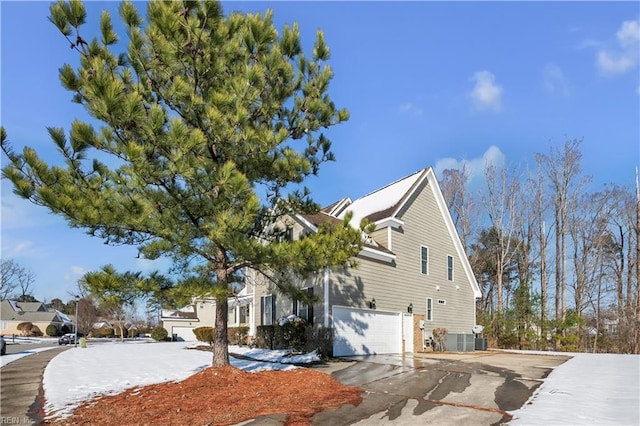 view of front of property with driveway and an attached garage