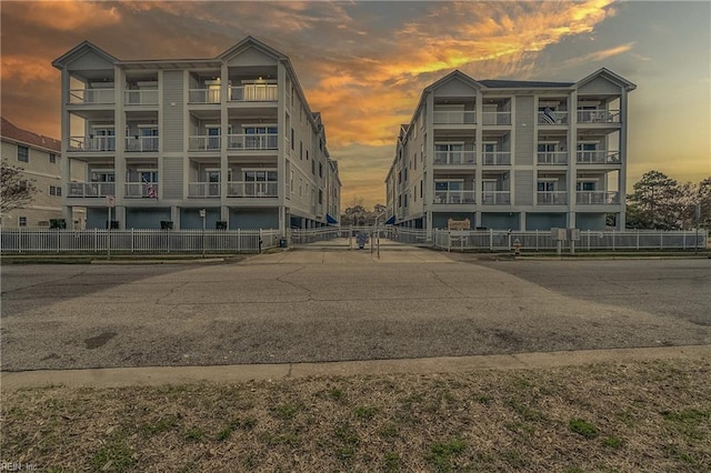 view of building exterior featuring fence