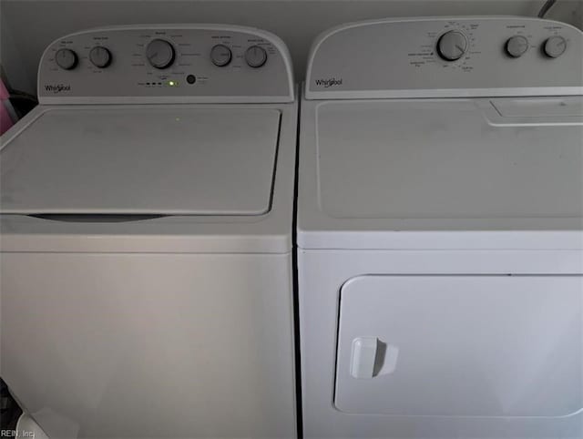 laundry area featuring laundry area and washing machine and clothes dryer