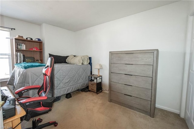 bedroom with light carpet