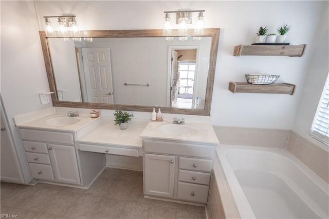 full bathroom with double vanity, plenty of natural light, and a sink