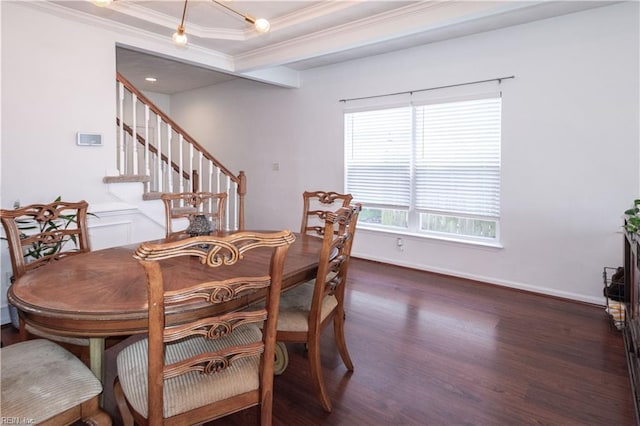 dining room featuring baseboards, stairs, ornamental molding, dark wood-style floors, and a tray ceiling