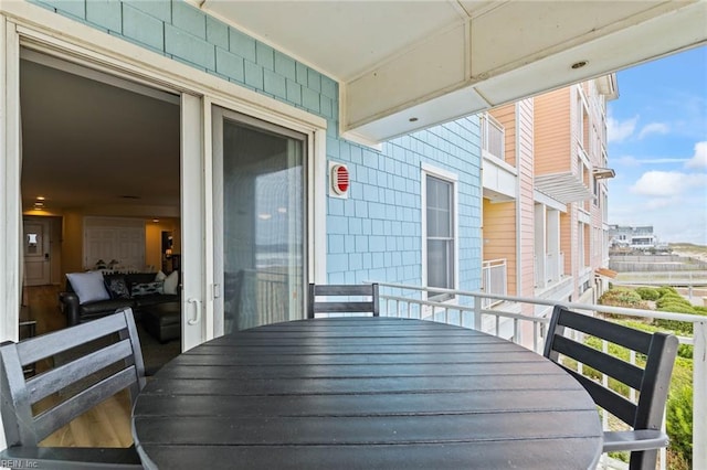 balcony with outdoor dining area