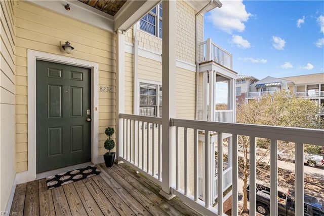 entrance to property featuring a balcony