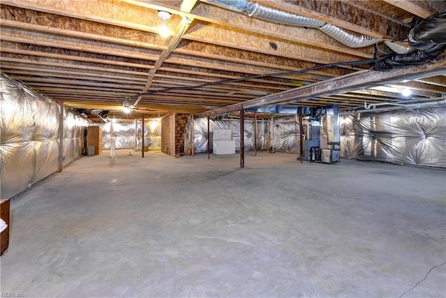 unfinished basement with heating unit