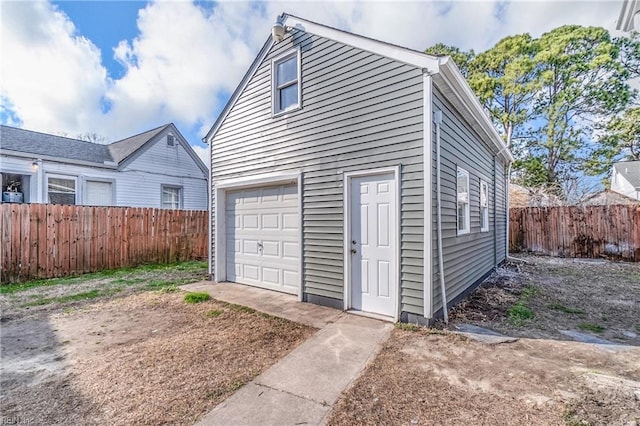 garage featuring fence