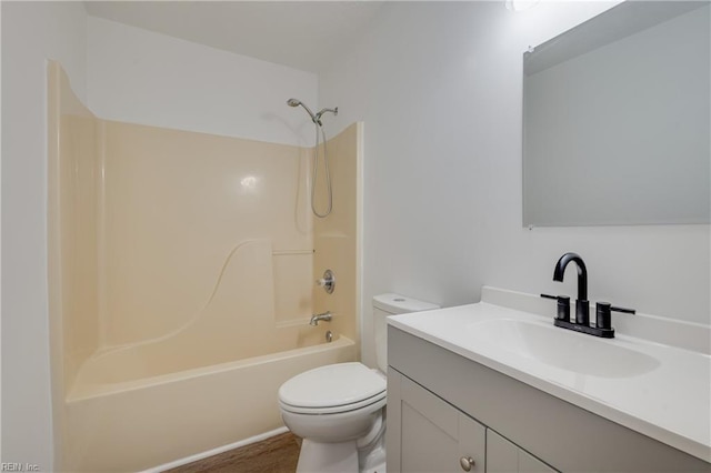 full bathroom with shower / bath combination, vanity, and toilet