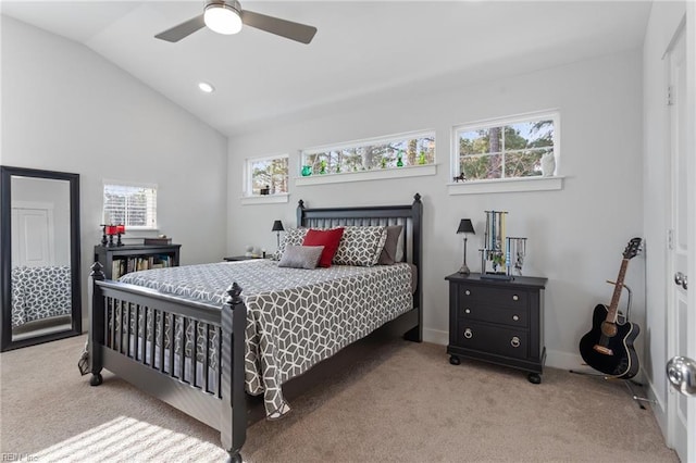 carpeted bedroom with a ceiling fan, recessed lighting, vaulted ceiling, and baseboards