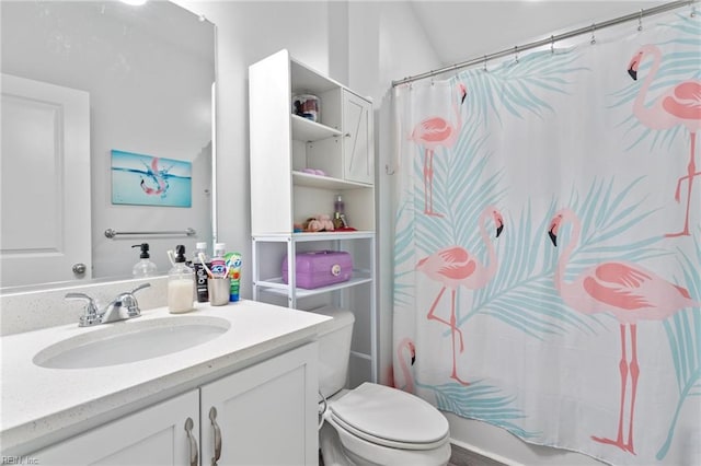 full bathroom with a shower with shower curtain, vanity, and toilet