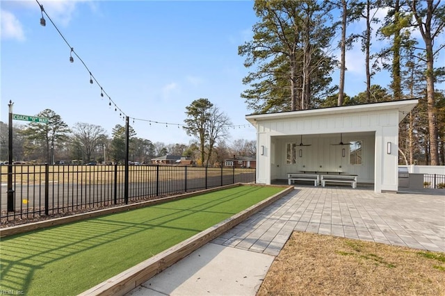 surrounding community featuring a patio area and fence