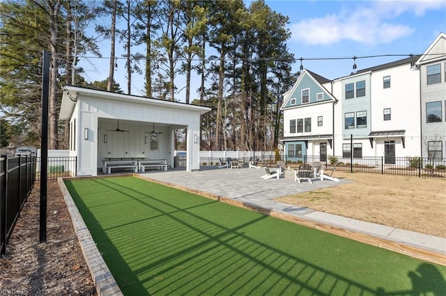 view of community featuring a patio and a fenced backyard