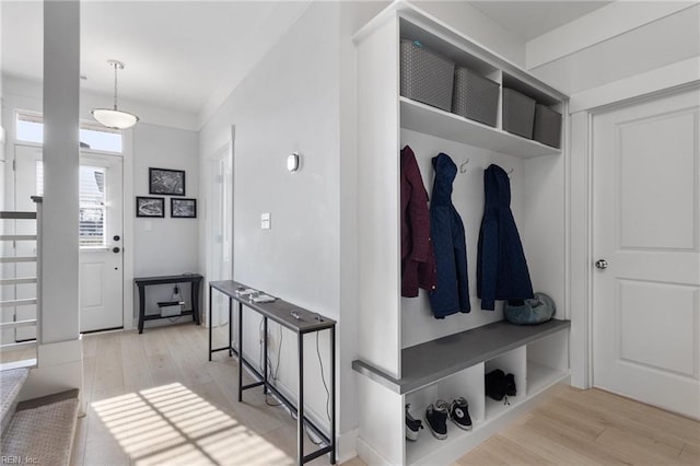 mudroom with wood finished floors