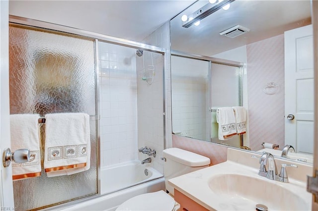 full bath featuring bath / shower combo with glass door, visible vents, toilet, vanity, and wallpapered walls