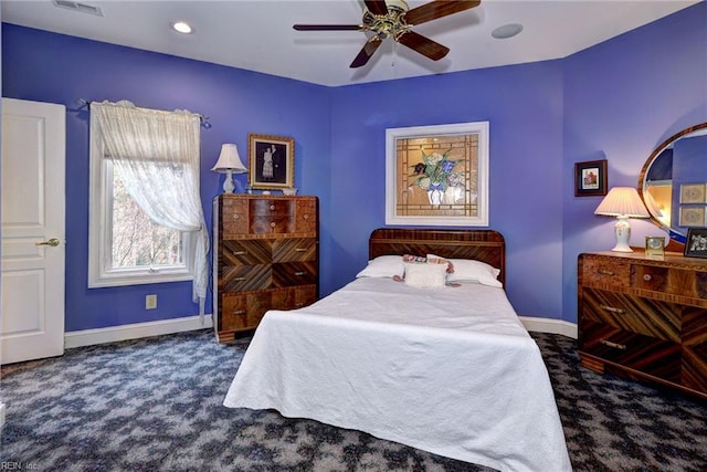 carpeted bedroom featuring recessed lighting, visible vents, baseboards, and a ceiling fan