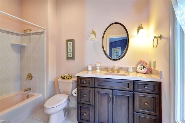 bathroom featuring vanity, tile patterned floors, toilet, and shower / bath combination