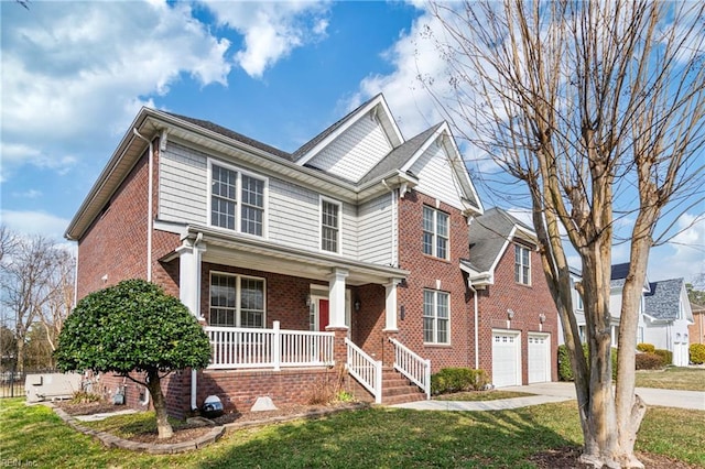 view of front of house with concrete driveway, an attached garage, covered porch, a front lawn, and brick siding