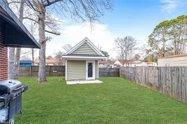 view of yard with a fenced backyard