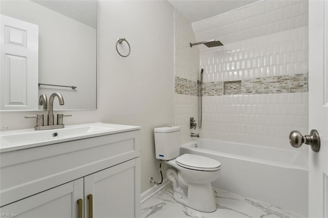 bathroom with marble finish floor, tub / shower combination, vanity, and toilet