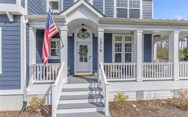 doorway to property with a porch