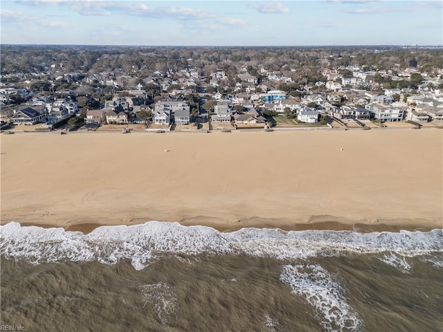 birds eye view of property with a residential view and a water view