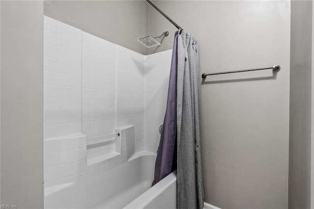 full bathroom with shower / bath combo with shower curtain