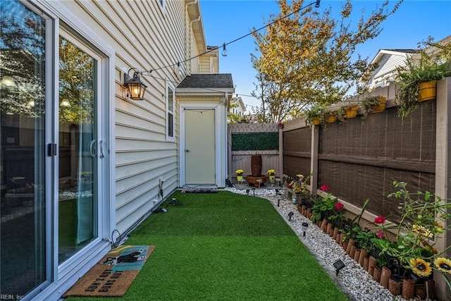 view of yard featuring a fenced backyard