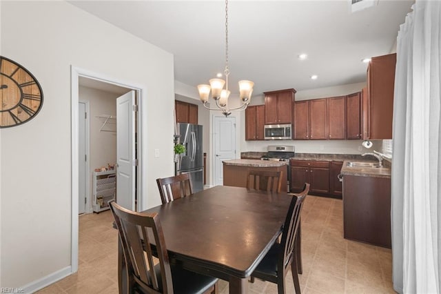 dining room featuring a chandelier, recessed lighting, and light tile patterned floors