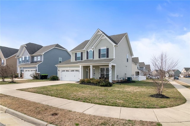 traditional home with central AC unit, a garage, driveway, a residential view, and a front lawn