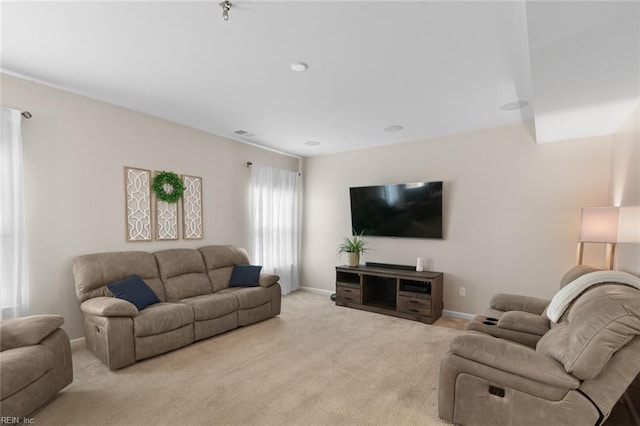 living area featuring carpet, visible vents, and baseboards