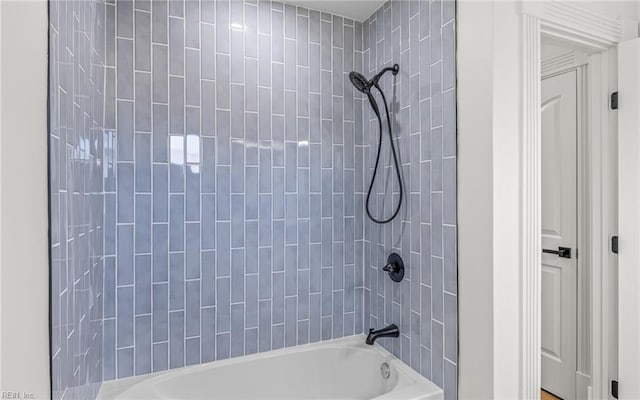 bathroom featuring  shower combination