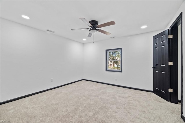 carpeted empty room with recessed lighting, visible vents, ceiling fan, and baseboards