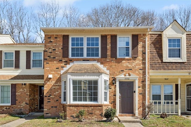 multi unit property featuring brick siding