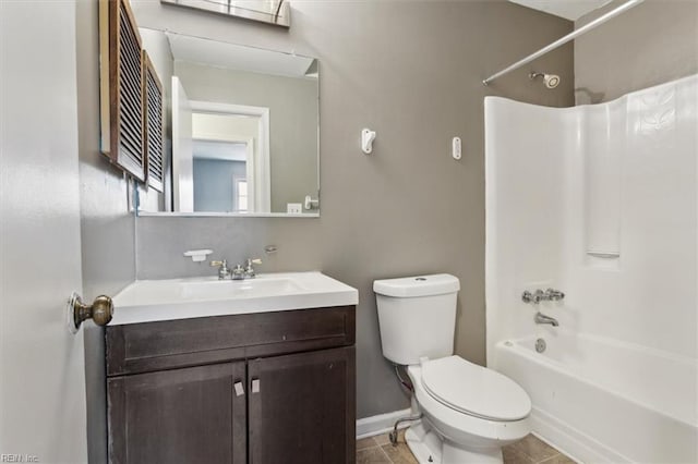 full bathroom with tile patterned flooring, toilet, shower / bath combination, vanity, and baseboards