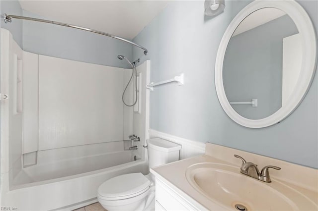 bathroom with shower / washtub combination, vanity, toilet, and tile patterned floors