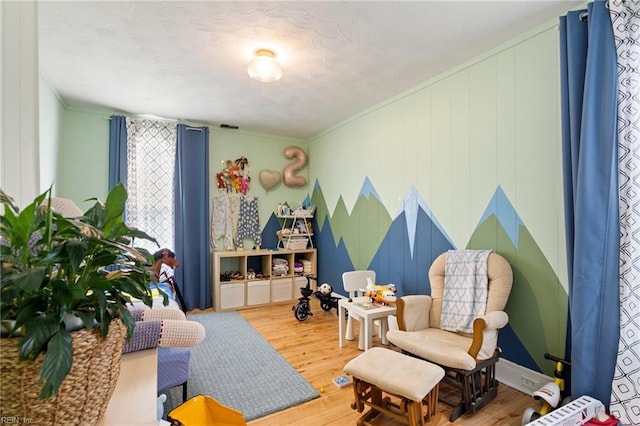 interior space featuring wood finished floors and visible vents